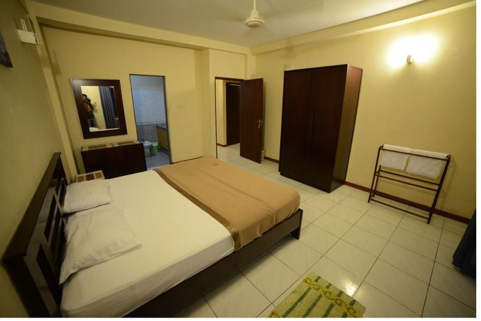 Imagen de la habitación del Hotel Palmyrah Residencies. Foto 11