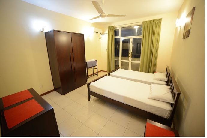 Imagen de la habitación del Hotel Palmyrah Residencies. Foto 14