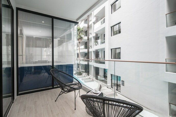 Imagen de la habitación del Hotel Palmyrah Surin Beach Residence. Foto 15