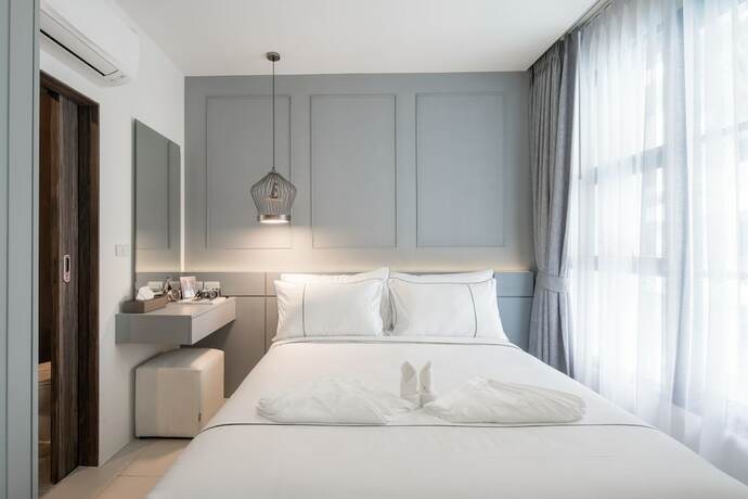 Imagen de la habitación del Hotel Palmyrah Surin Beach Residence. Foto 16