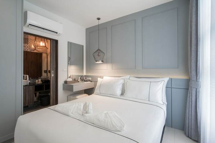 Imagen de la habitación del Hotel Palmyrah Surin Beach Residence. Foto 24