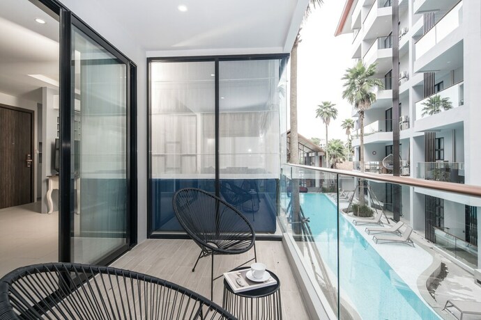 Imagen de la habitación del Hotel Palmyrah Surin Beach Residence. Foto 26