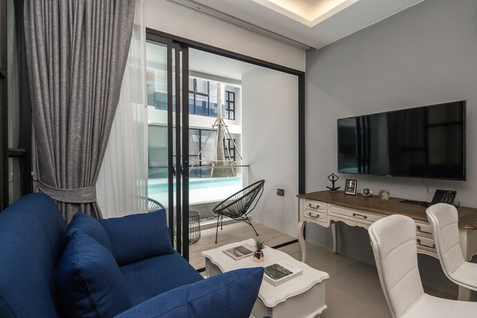 Imagen de la habitación del Hotel Palmyrah Surin Beach Residence. Foto 29