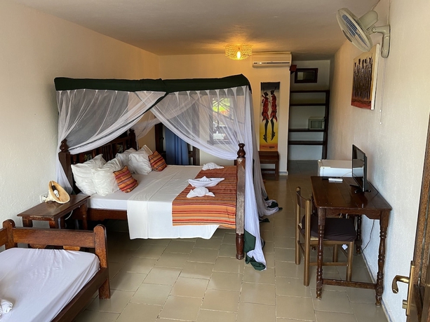 Imagen de la habitación del Hotel Palumbo Kendwa. Foto 7
