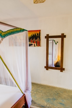 Imagen de la habitación del Hotel Palumbo Kendwa. Foto 8