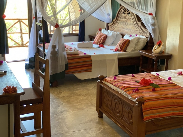 Imagen de la habitación del Hotel Palumbo Kendwa. Foto 9
