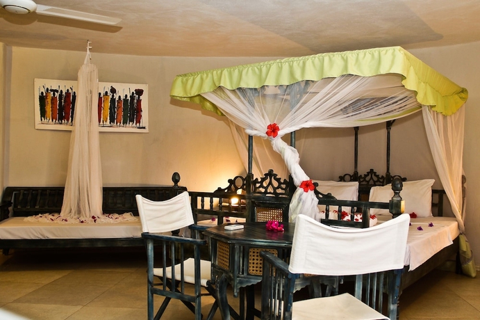 Imagen de la habitación del Hotel Palumbo Kendwa. Foto 10