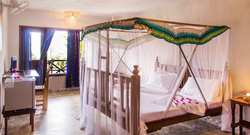 Imagen de la habitación del Hotel Palumbo Kendwa. Foto 11