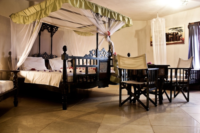 Imagen de la habitación del Hotel Palumbo Kendwa. Foto 15