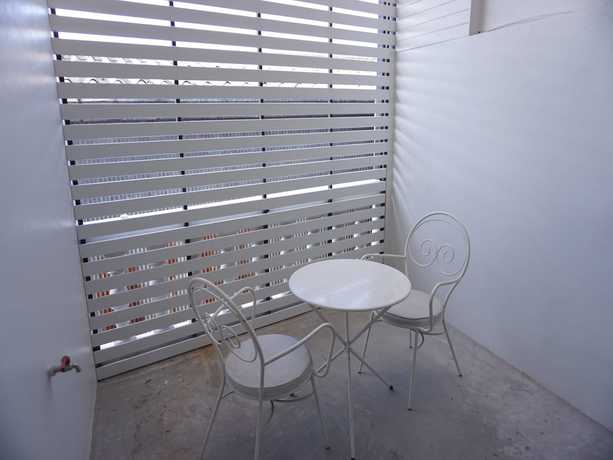 Imagen de la habitación del Hotel Pama House Apartment. Foto 2