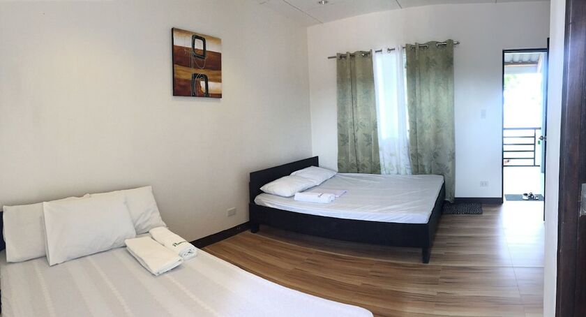 Imagen de la habitación del Hotel Pamana Beach Resort. Foto 12
