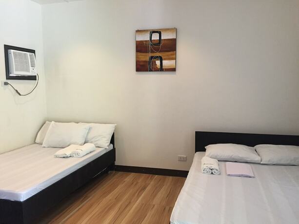 Imagen de la habitación del Hotel Pamana Beach Resort. Foto 15