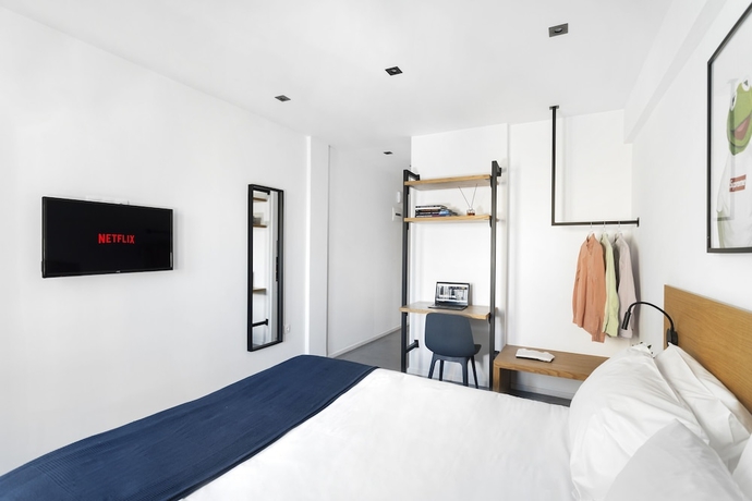 Imagen de la habitación del Hotel Pame House. Foto 16