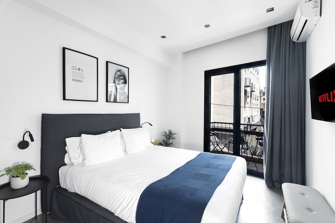 Imagen de la habitación del Hotel Pame House. Foto 17