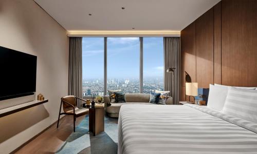 Imagen de la habitación del Hotel Pan Pacific Jakarta. Foto 12