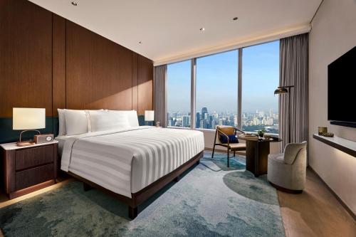 Imagen de la habitación del Hotel Pan Pacific Jakarta. Foto 20