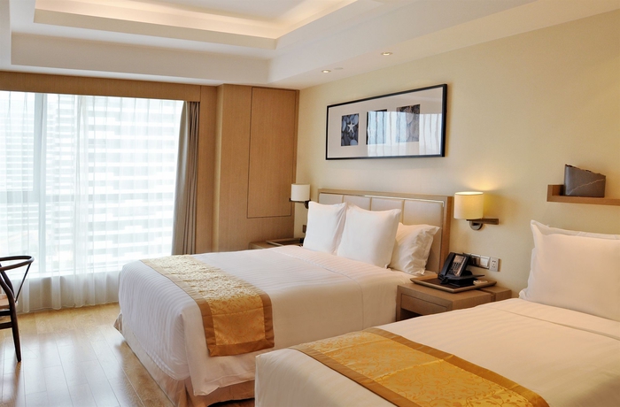 Imagen de la habitación del Hotel Pan Pacific Serviced Suites Ningbo. Foto 5