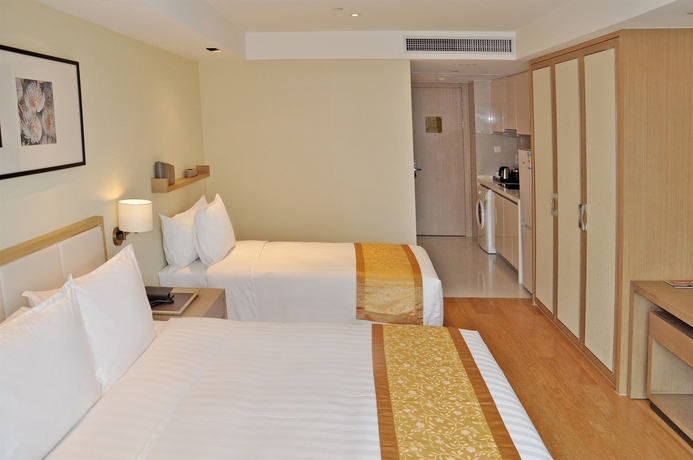 Imagen de la habitación del Hotel Pan Pacific Serviced Suites Ningbo. Foto 6