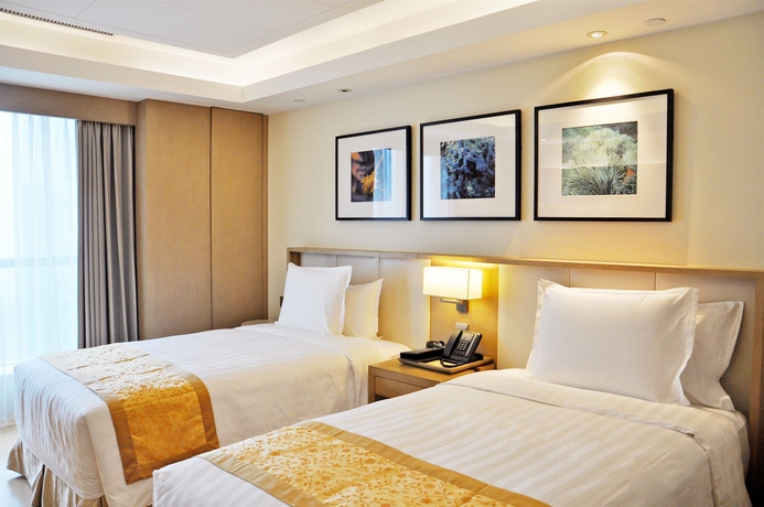 Imagen de la habitación del Hotel Pan Pacific Serviced Suites Ningbo. Foto 7