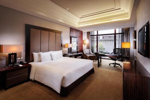 Imagen de la habitación del Hotel Pan Pacific Suzhou. Foto 9