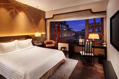 Imagen de la habitación del Hotel Pan Pacific Suzhou. Foto 10