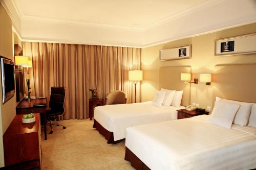 Imagen de la habitación del Hotel Pan Pacific Suzhou. Foto 13