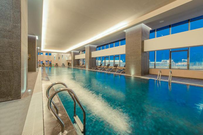 Imagen de la piscina del Hotel Pan Pacific Tianjin. Foto 10