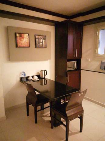Imagen de la habitación del Hotel Panacea Suites. Foto 12