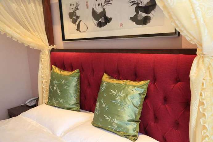 Imagen de la habitación del Hotel Panda Prince. Foto 19