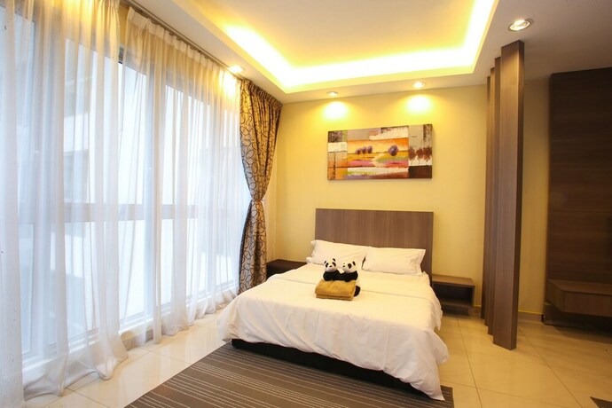 Imagen de la habitación del Hotel Panda Residences at Regalia. Foto 13
