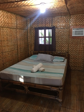 Imagen de la habitación del Hotel Pandan Beach Resort. Foto 7