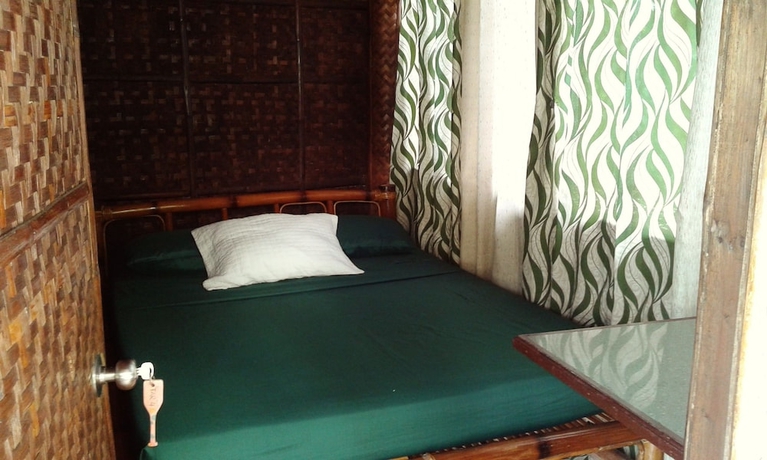 Imagen de la habitación del Hotel Pandan Beach Resort. Foto 8