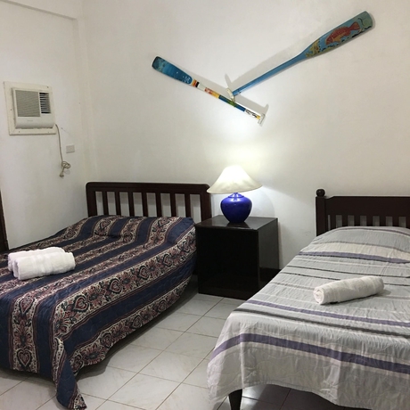 Imagen de la habitación del Hotel Pandan Beach Resort. Foto 11
