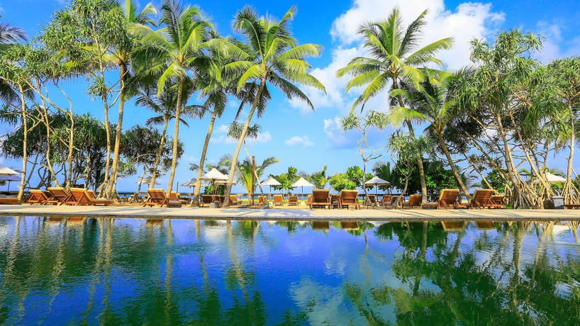 Imagen de la piscina del Hotel Pandanus Beach Resort & Spa. Foto 19