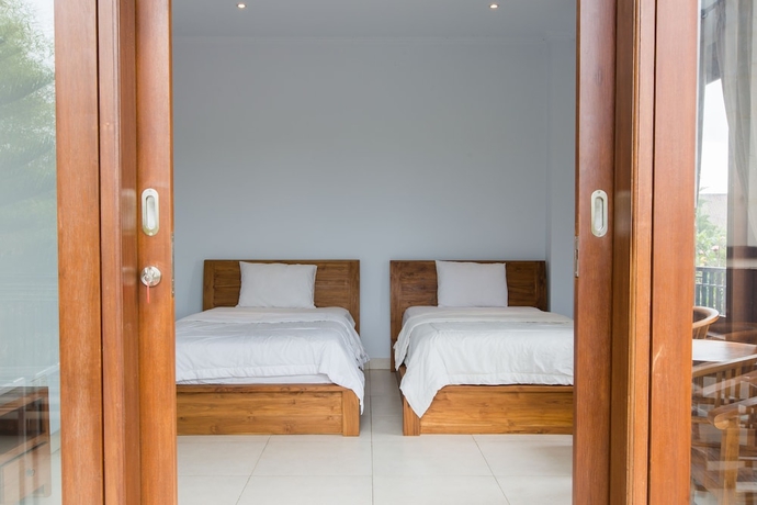 Imagen de la habitación del Hotel Pande Homestay. Foto 18