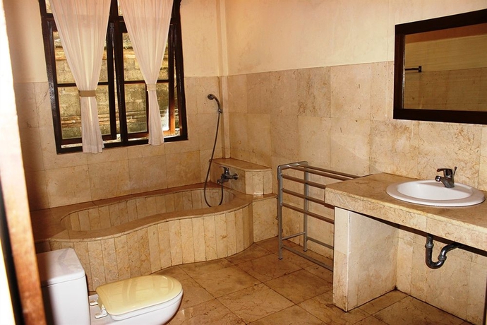 Imagen de la habitación del Hotel Pande Permai Bungalows. Foto 4