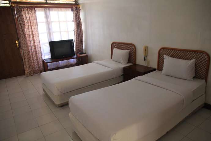 Imagen de la habitación del Hotel Pandu Lakeside Tuktuk. Foto 6