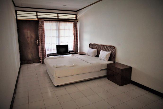 Imagen de la habitación del Hotel Pandu Lakeside Tuktuk. Foto 7