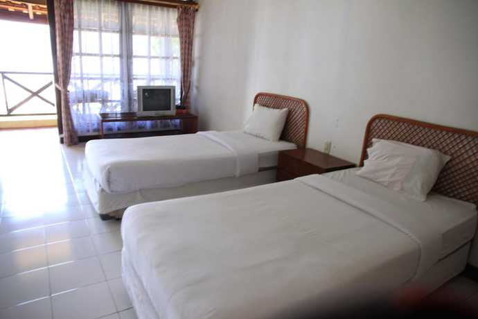 Imagen de la habitación del Hotel Pandu Lakeside Tuktuk. Foto 10