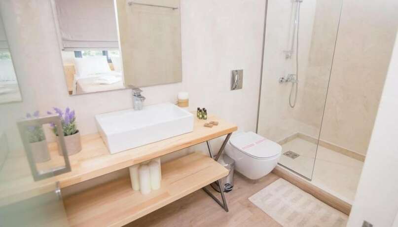 Imagen de la habitación del Hotel Panellinion Luxury Rooms. Foto 12
