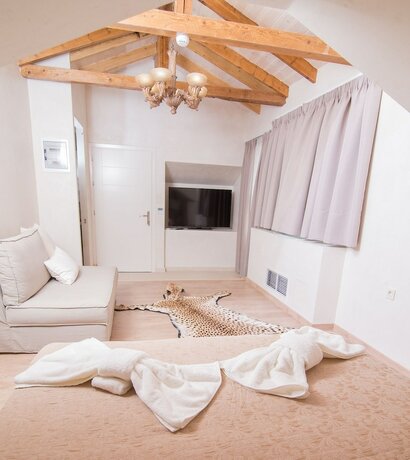Imagen de la habitación del Hotel Panellinion Luxury Rooms. Foto 20