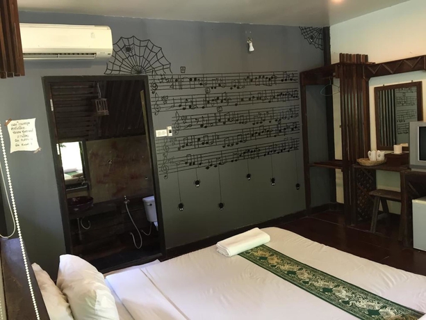 Imagen de la habitación del Hotel Pang Mai Resort. Foto 13