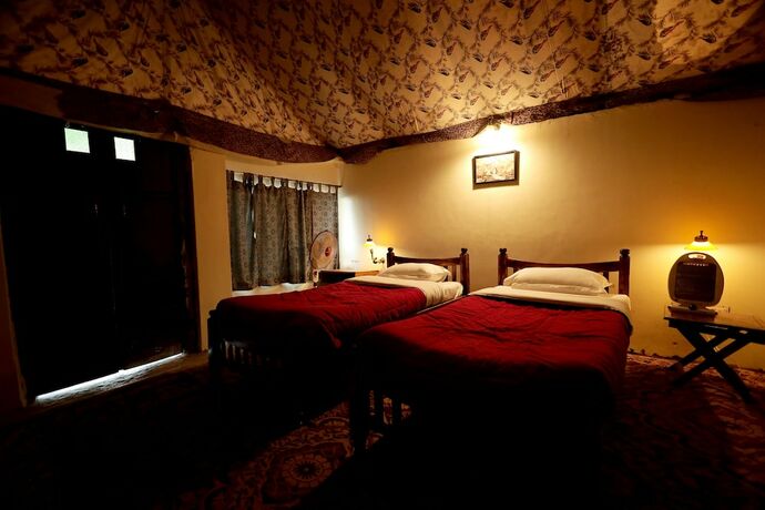Imagen de la habitación del Hotel Pangarh Lake Retreat. Foto 14