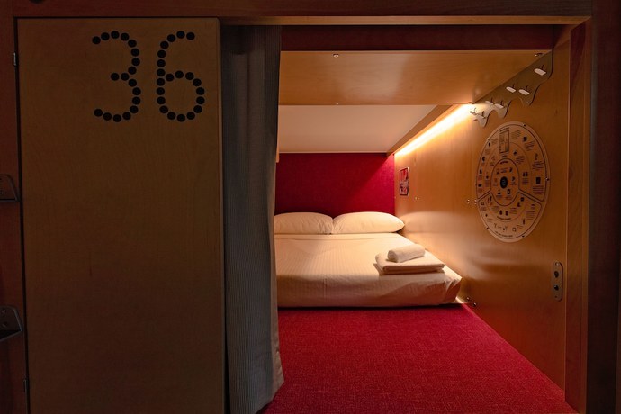 Imagen de la habitación del Hotel Pangea Pod. Foto 15