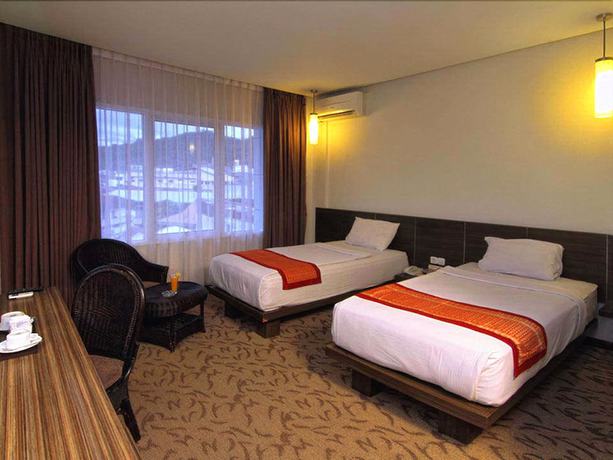 Imagen de la habitación del Hotel Pangeran City. Foto 7