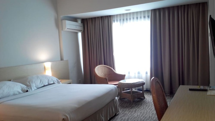 Imagen de la habitación del Hotel Pangeran City. Foto 11