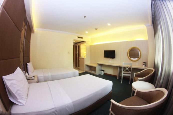 Imagen de la habitación del Hotel Pangrango II. Foto 16