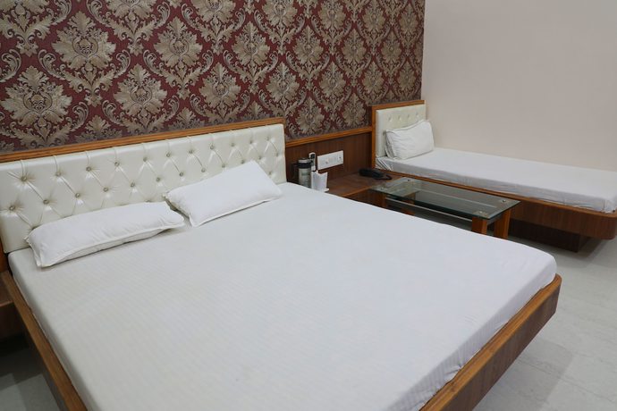 Imagen de la habitación del Hotel Panigrahan. Foto 18