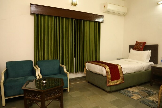 Imagen de la habitación del Hotel Panna Tiger Resort. Foto 19