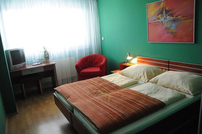 Imagen de la habitación del Hotel Panon. Foto 15